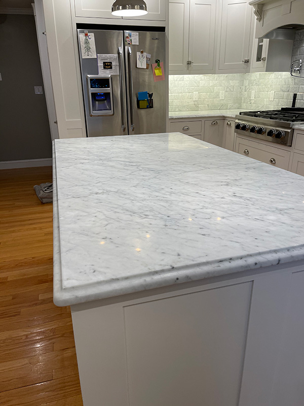 a marble floor that has been restored to a high shine